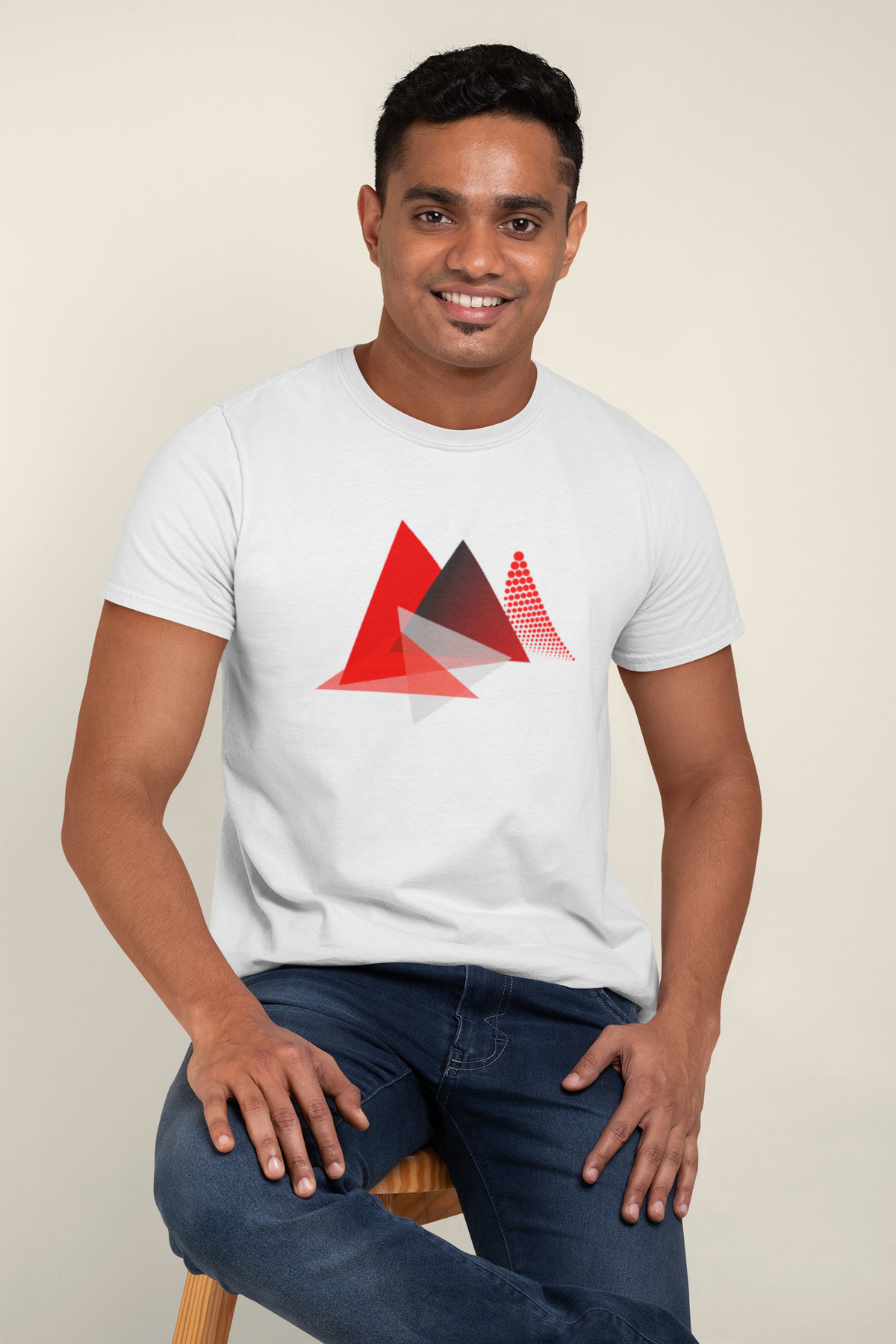Model wearing the white Apex Triangle tee with red geometric motif.
