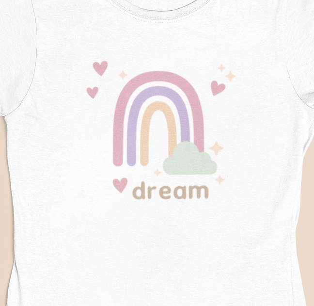 Close‑up of the pastel rainbow and heart motif with “dream” typography showing soft colours and crisp print detail.