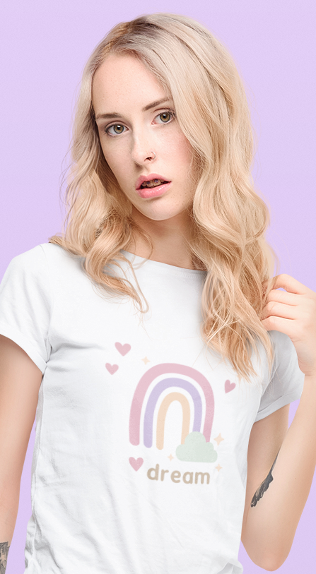 Second model shot of the Dream Pastel Rainbow Tee, highlighting the pastel rainbow, hearts, and “dream” typography on a slim‑fit white tee.