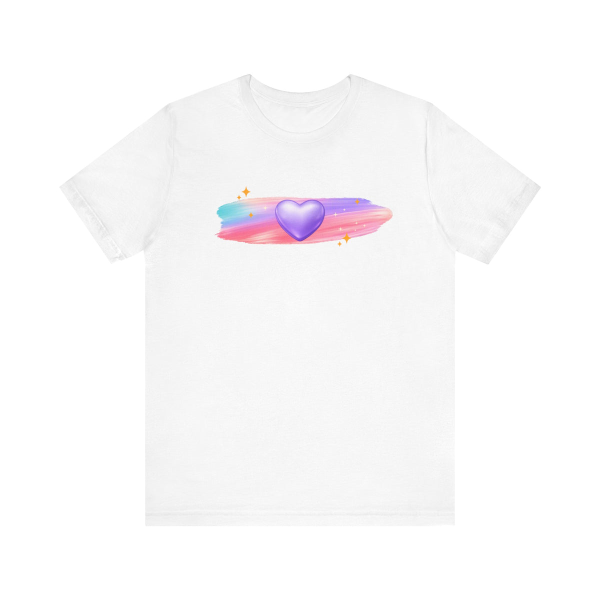 Flat lay of a white t‑shirt displaying a glowing purple heart with pastel brushstroke background and delicate sparkle details.
