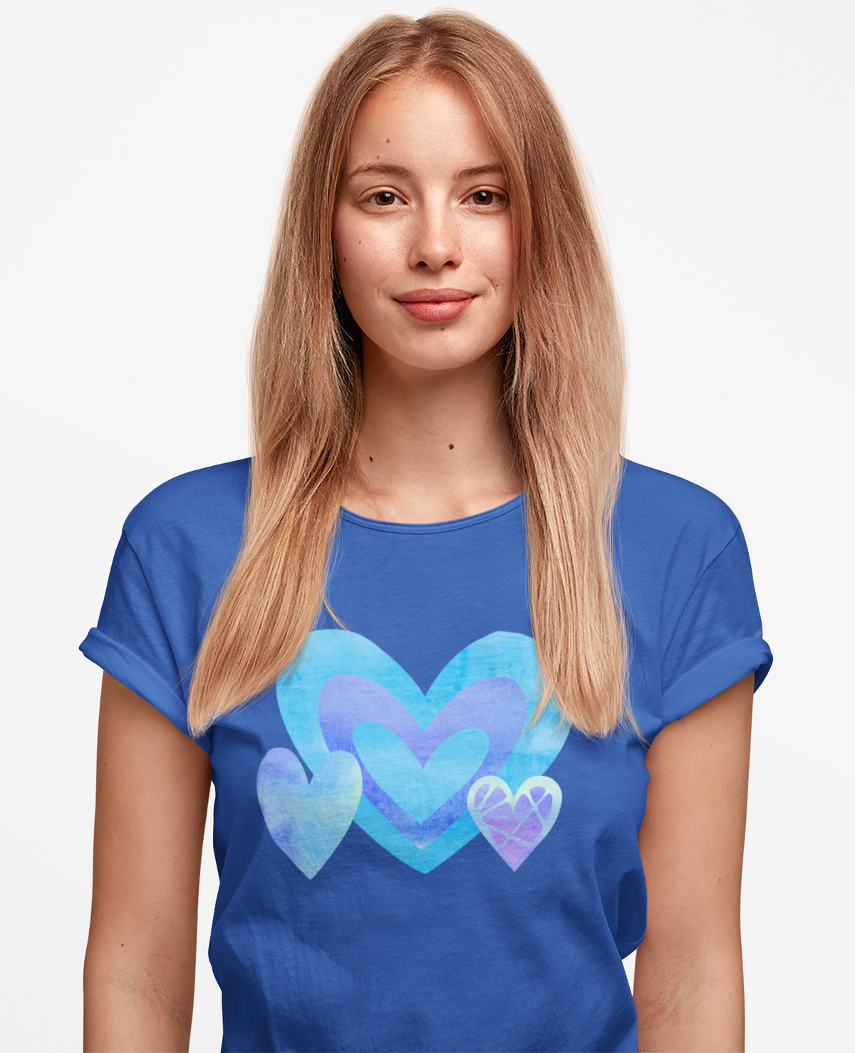 Model wearing the Royal tee showcasing the layered blue, purple, and blush triple‑heart motif.