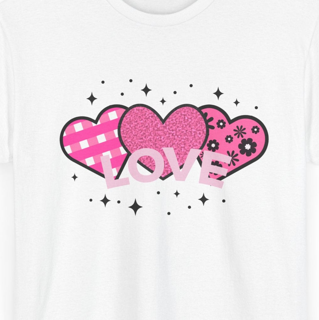  Close‑up of the pink LOVE heart trio motif with soft graphic texture.