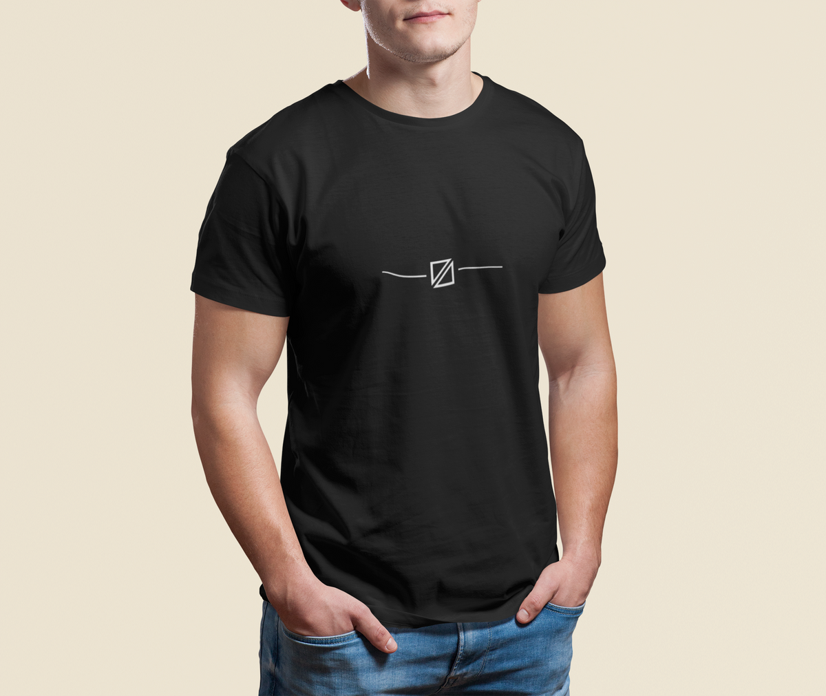 Model wearing the Minimal Geometric Crest Tee in Black with small linework symbol motif on the chest.