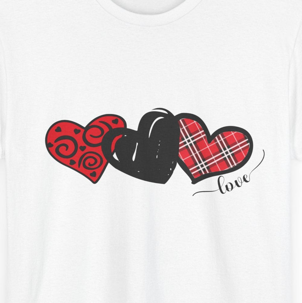 Close‑up view of the Triple Heart motif showing swirl, solid and plaid textures with crisp print detail.