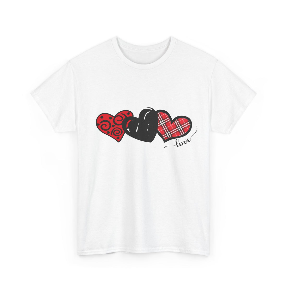 Flat lay of the Triple Heart tee featuring swirl, solid and plaid hearts on a soft unisex T‑shirt.